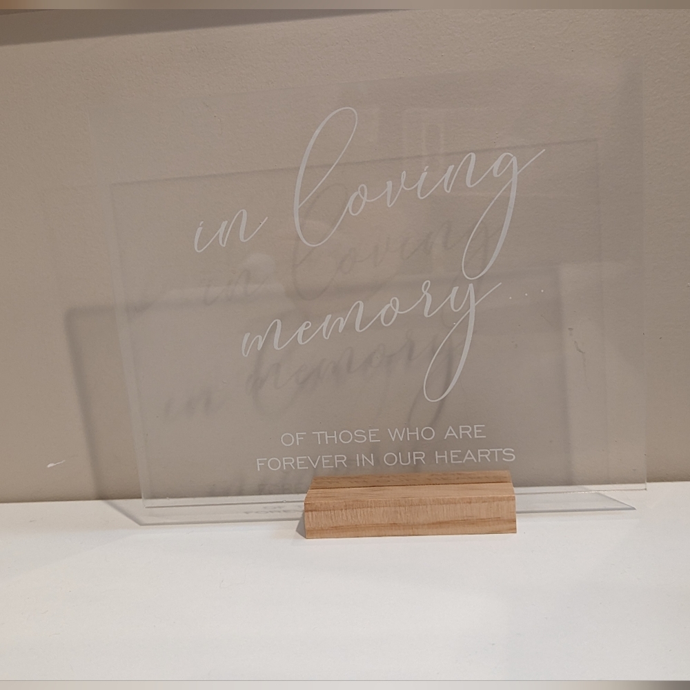 Clear acrylic sign "in loving memory" for memory table at wedding